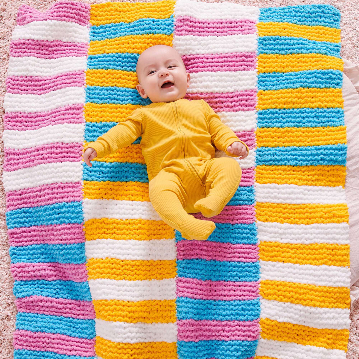 Knit Blanket made in Bernat Baby Blanket yarn