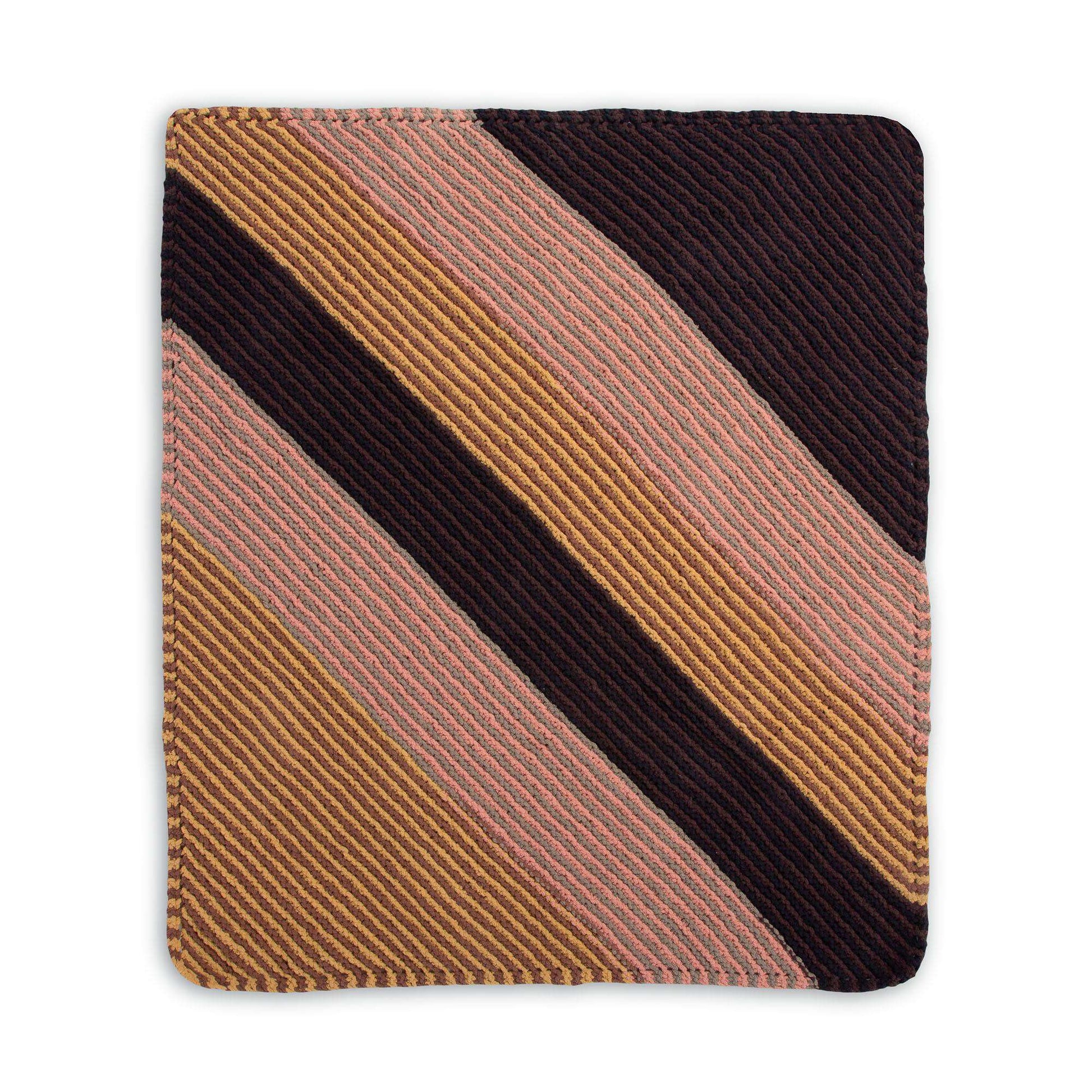 Free Bernat Knit Beginner Bias Striped Blanket Pattern
