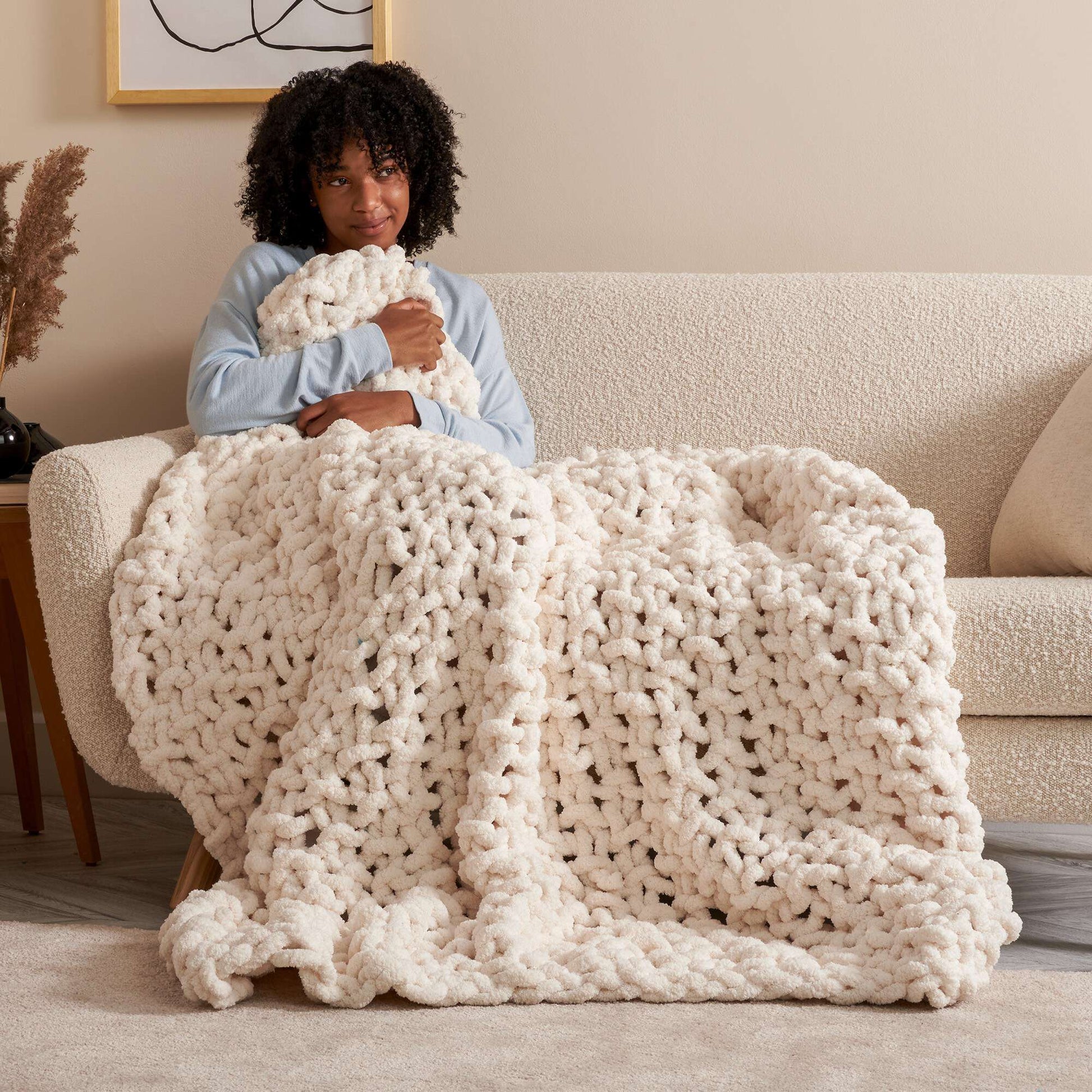 Looking for patterns to use for this Bernat blanket yarn, I