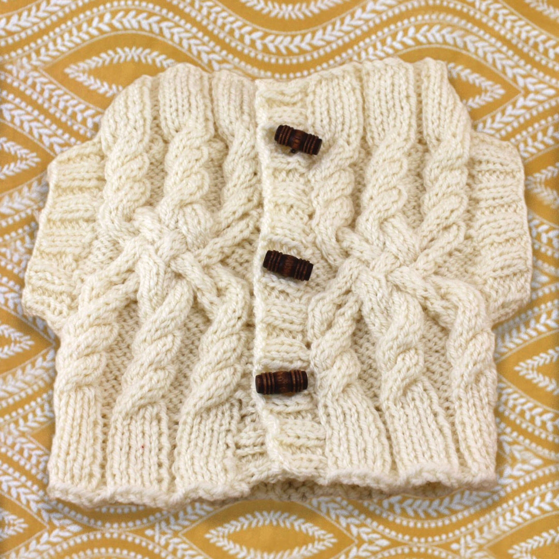 Free Patons Knit Aran Sweater Tea Cozy Pattern