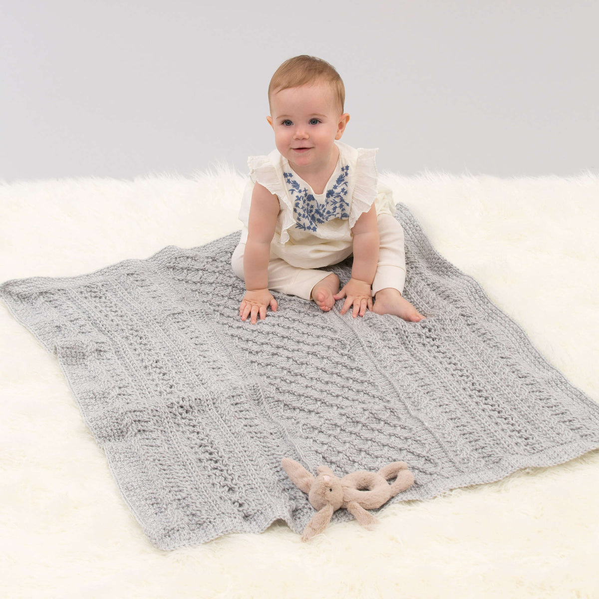 Crochet Blanket made in Red Heart Soft Baby Steps Yarn