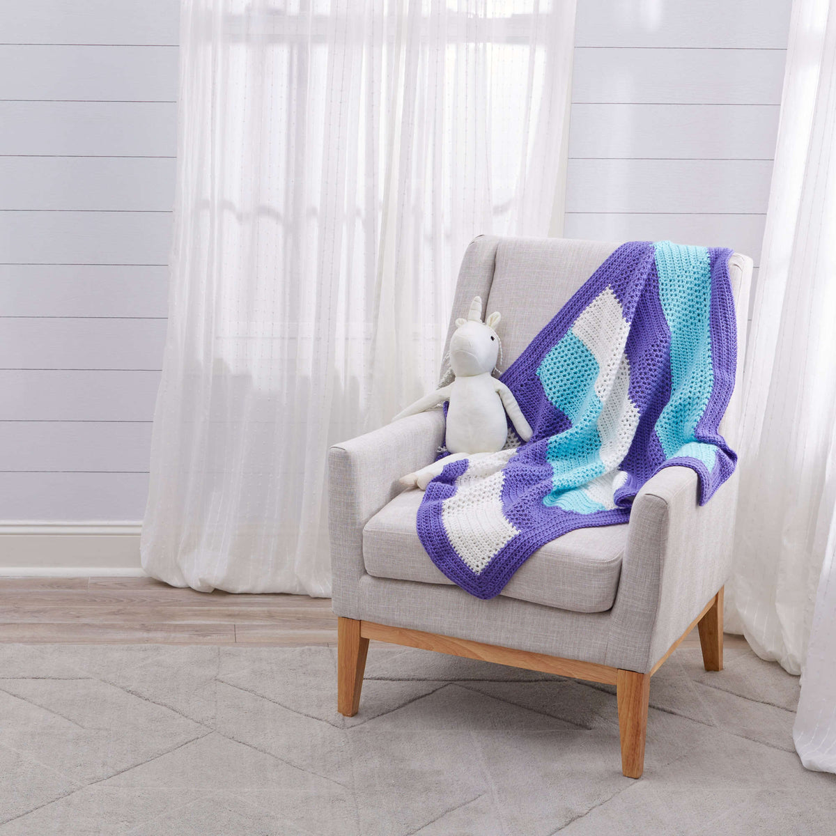 Crochet Blanket made in Red Heart Soft Baby Steps Yarn