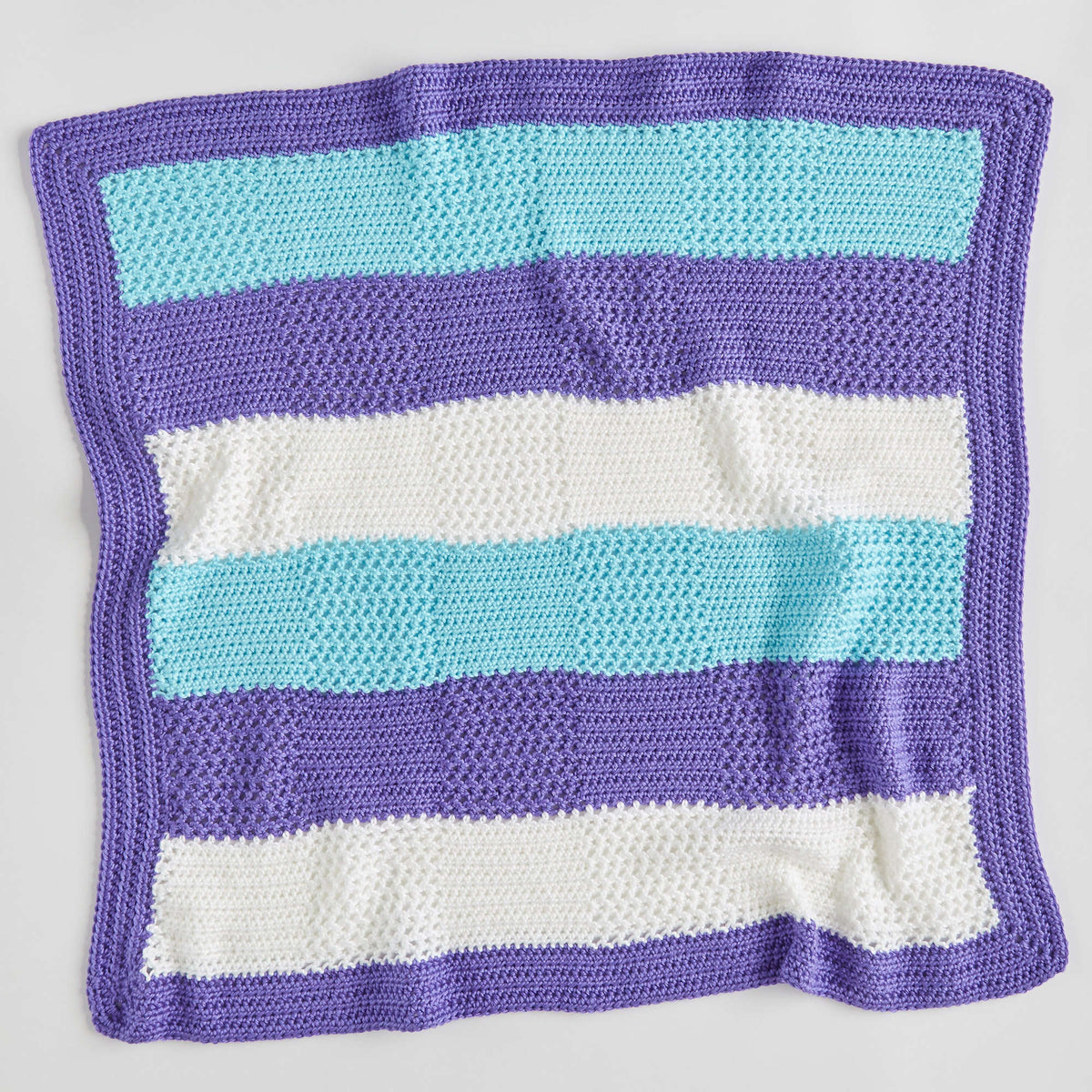 Crochet Blanket made in Red Heart Soft Baby Steps Yarn