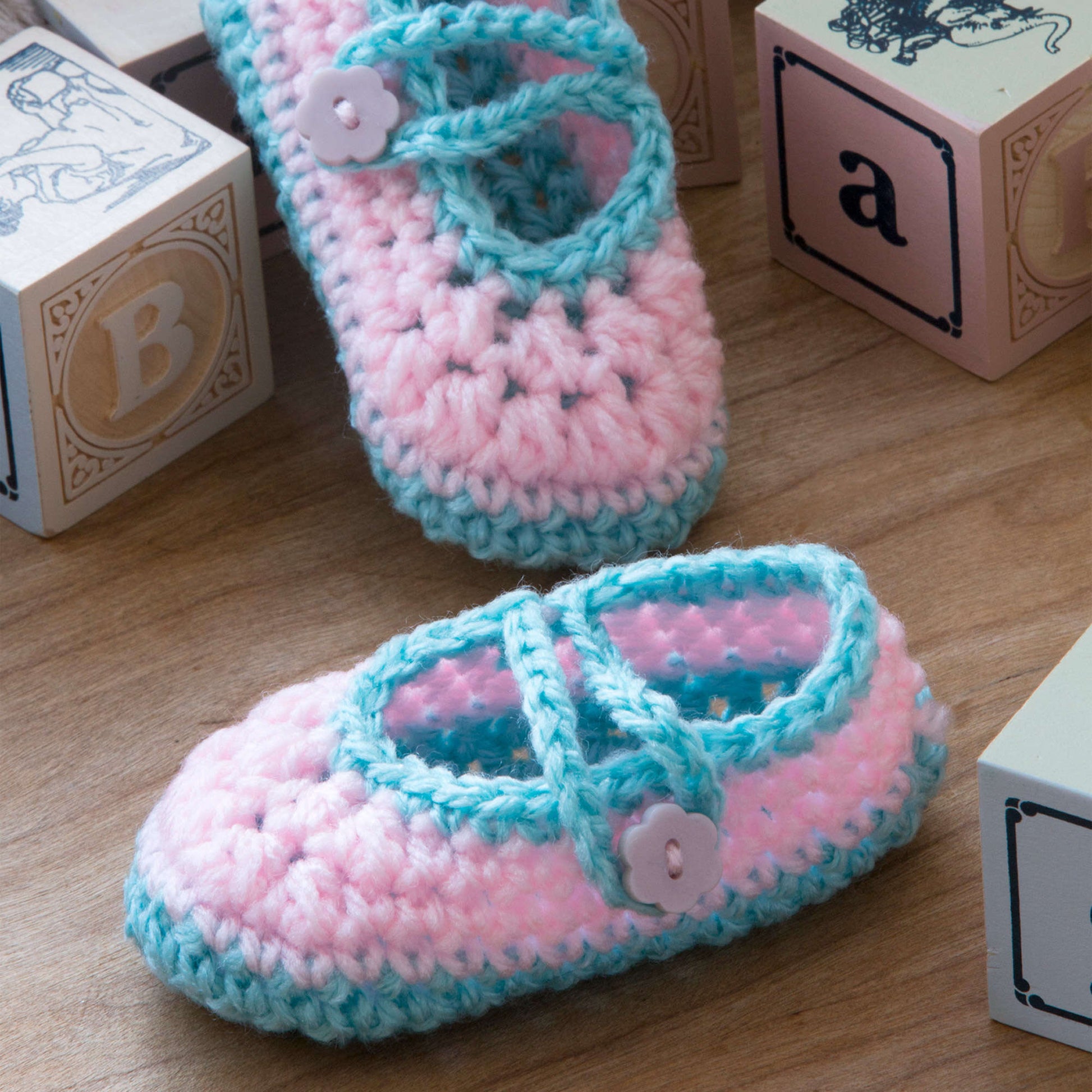 Free Red Heart Crochet Two-Color Baby Booties Pattern