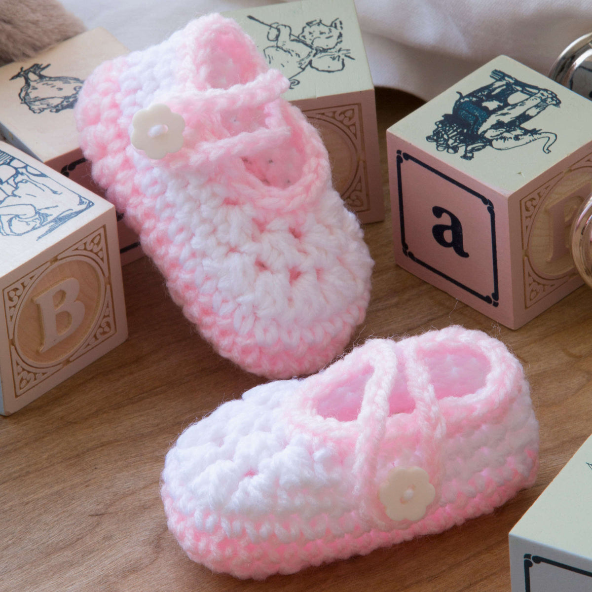 Crochet Booties made in Red Heart Baby Hugs Light Yarn