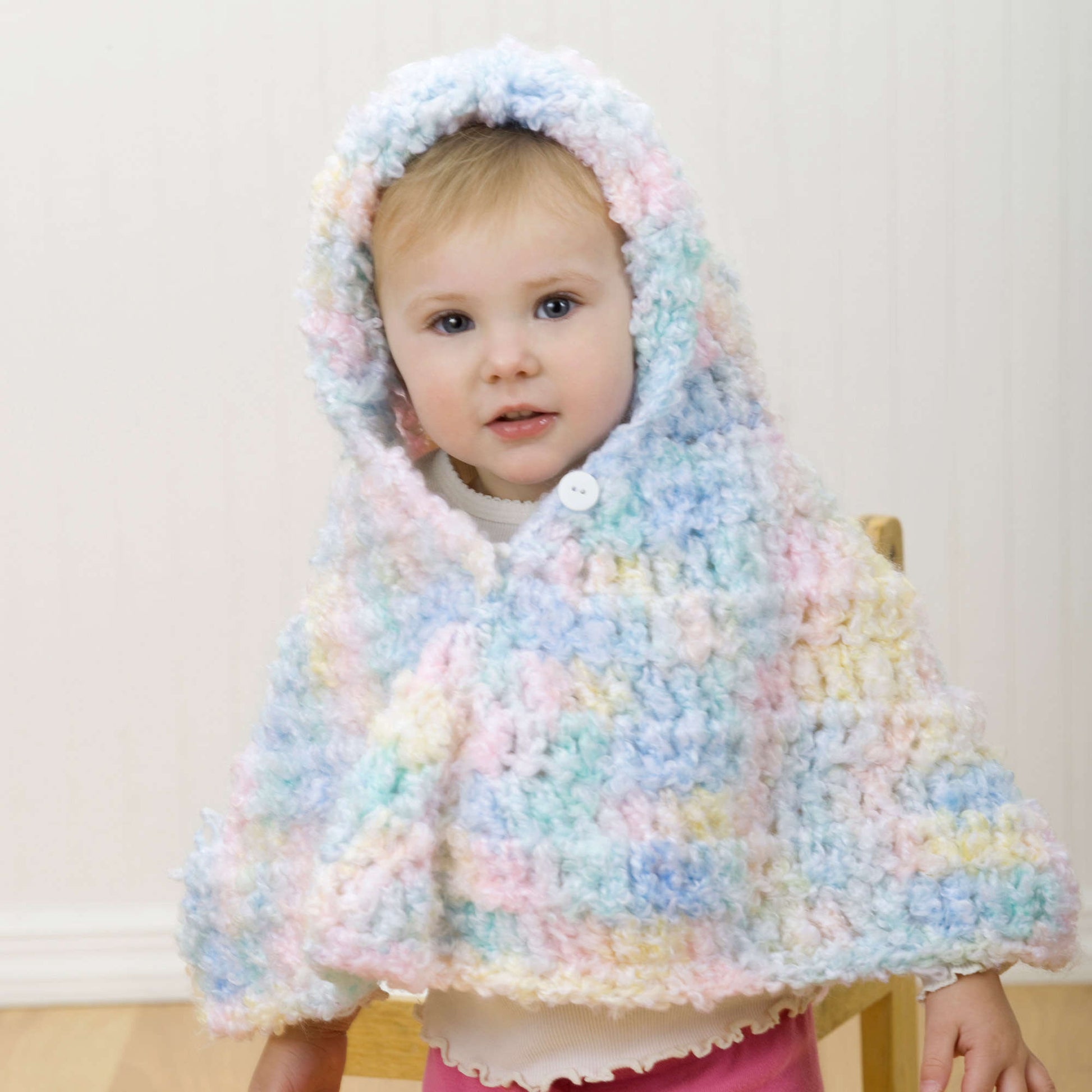 Free Red Heart Hooded Crochet Baby Poncho Pattern