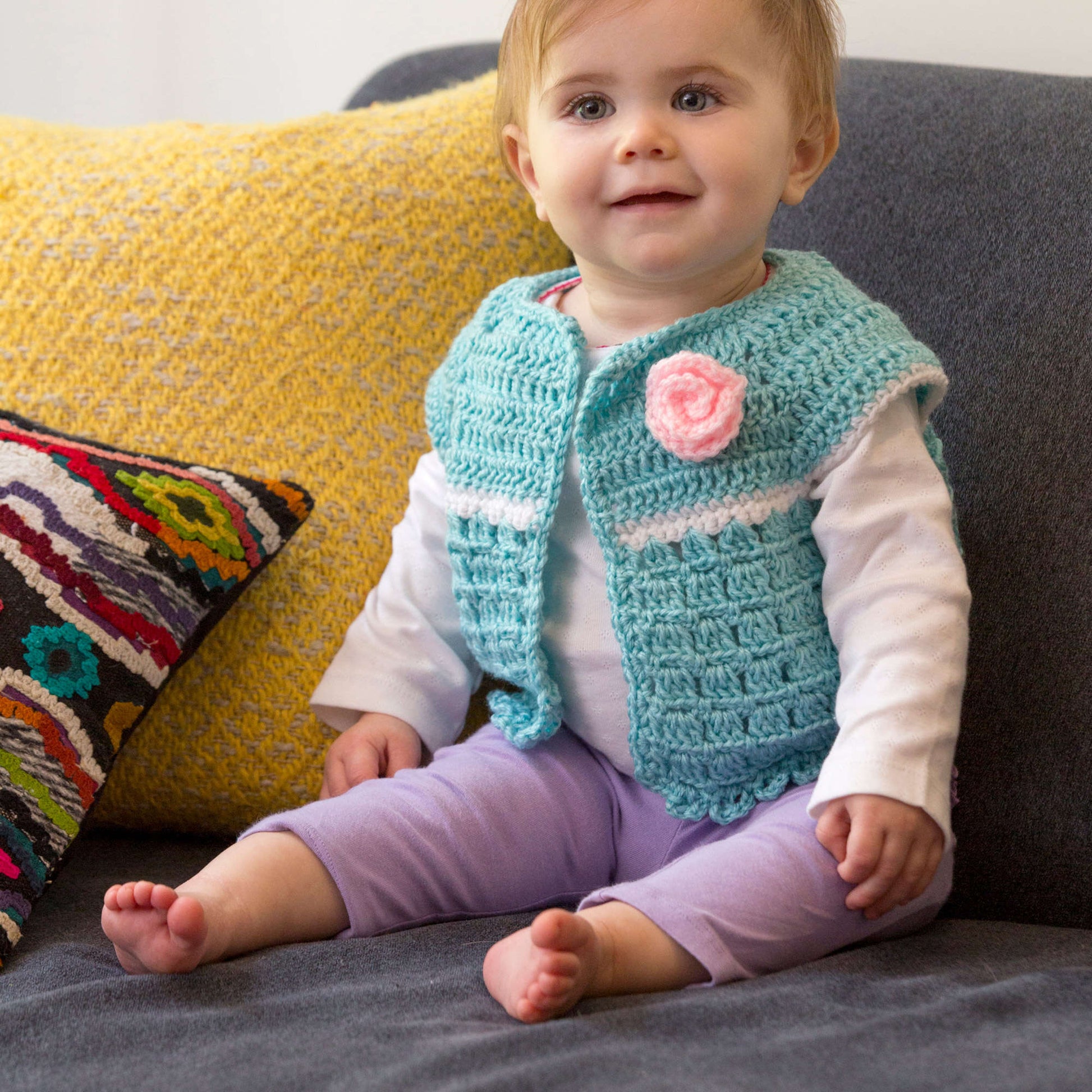 Free Red Heart Crochet Sweet Abby's Baby Sweater Pattern