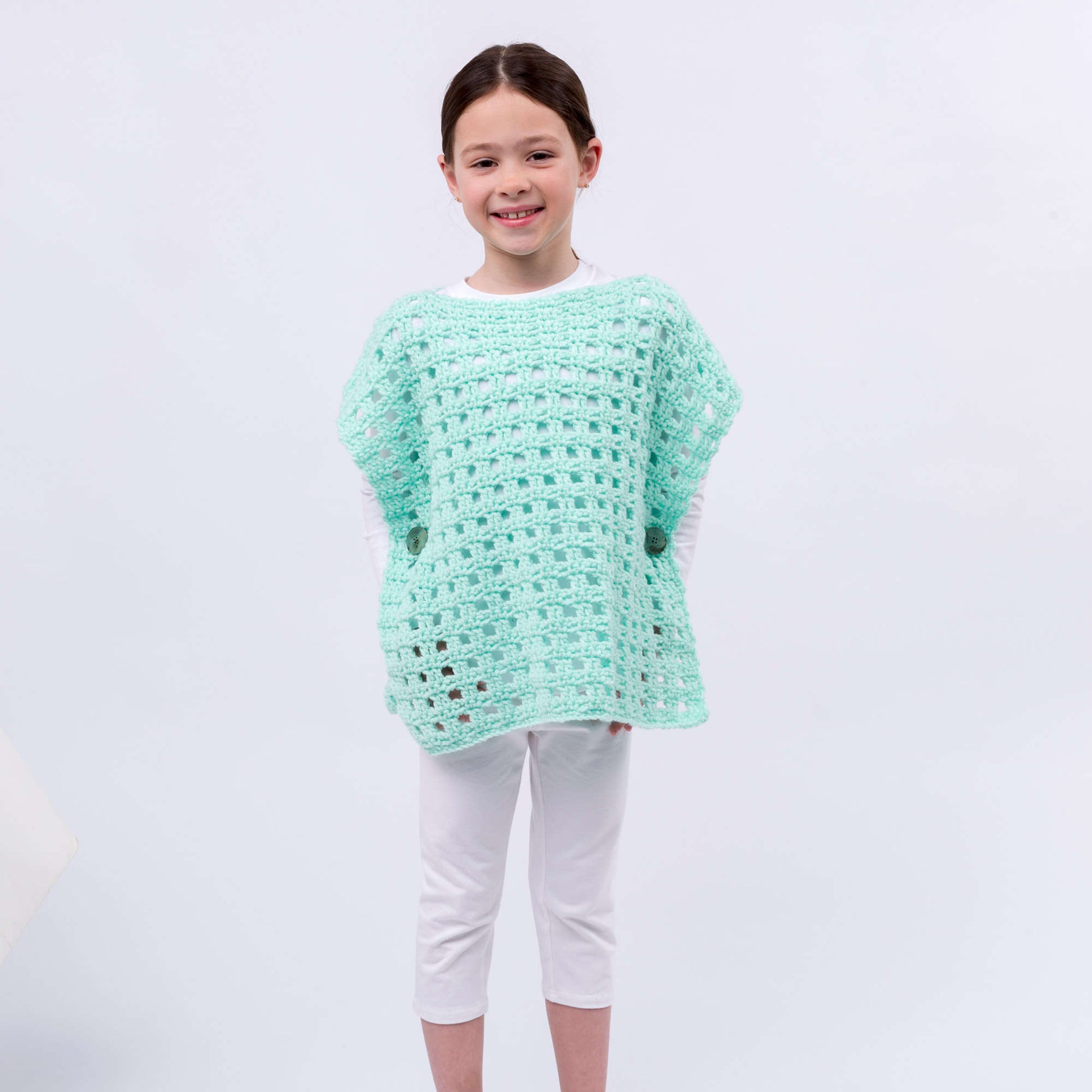 Free Red Heart Crochet Simply Stated Child Poncho Pattern