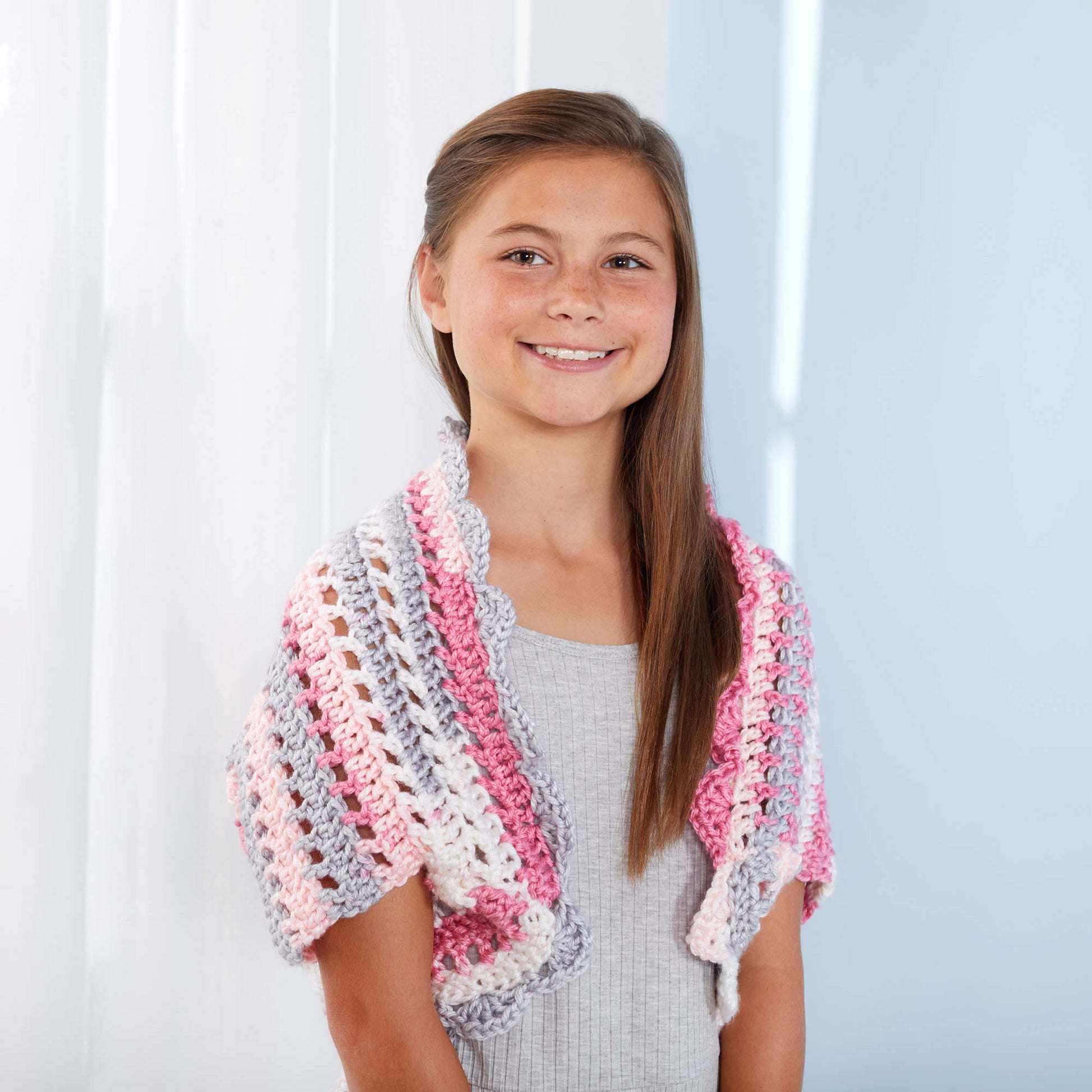 Free Red Heart Adorable Girl's Shrug Crochet Pattern