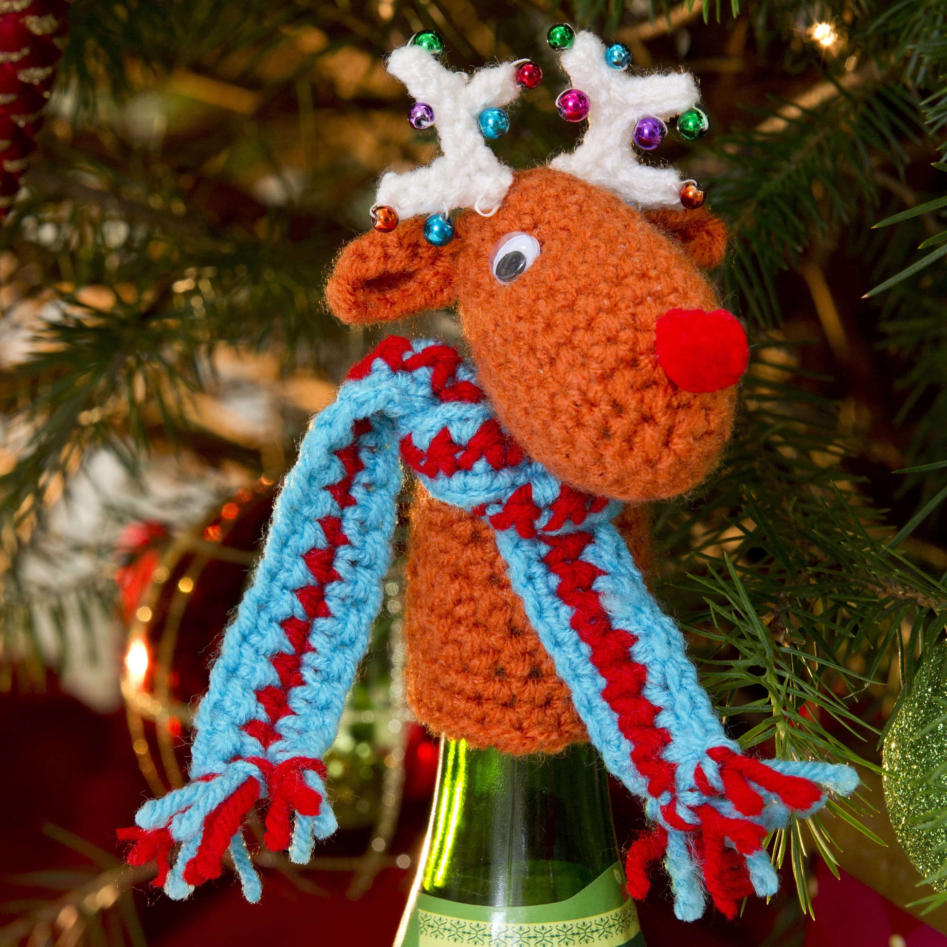 Free Red Heart Fa-la-la-la-Reindeer Bottle Top Crochet Pattern