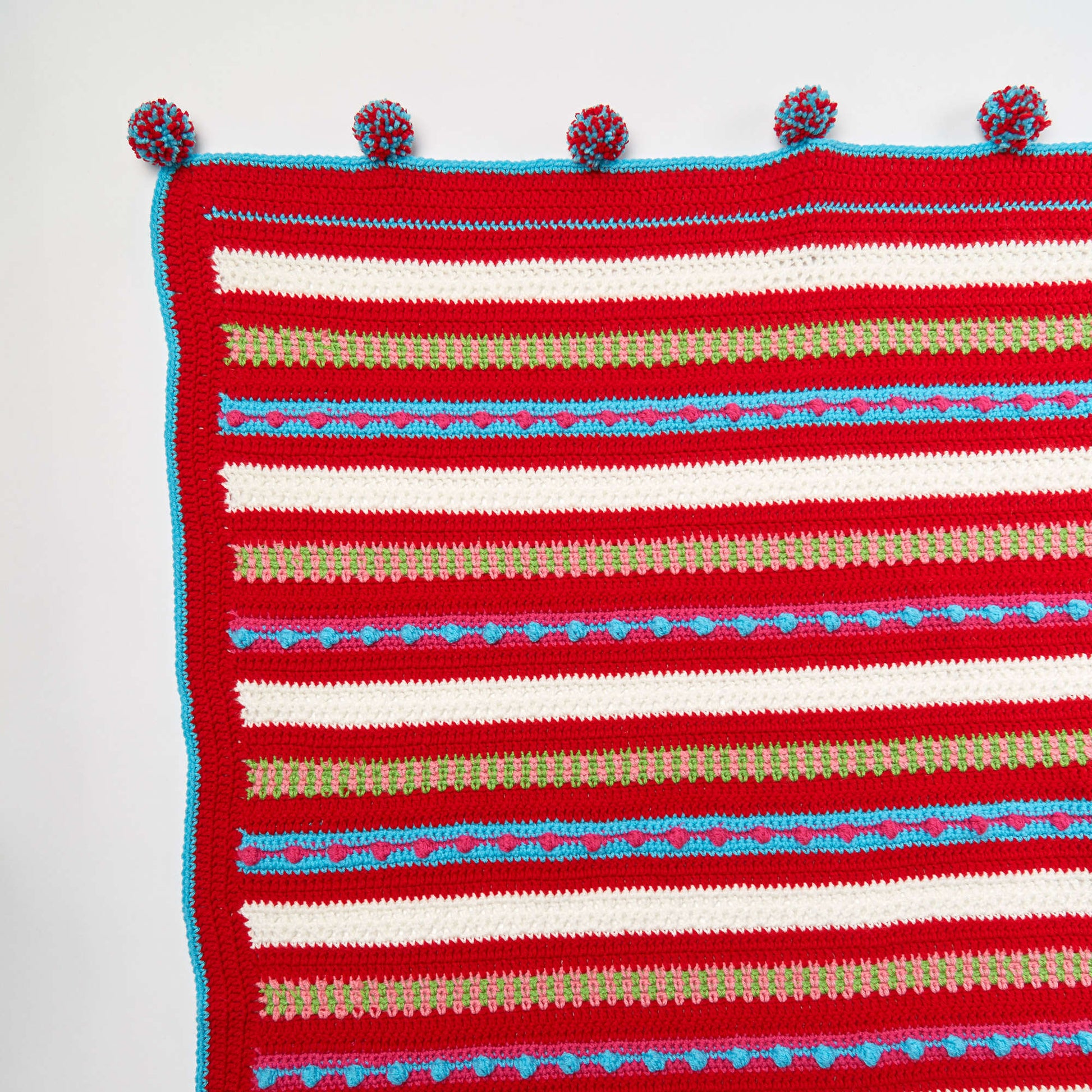 Free Red Heart Crochet Christmas Morning Striped Throw Pattern