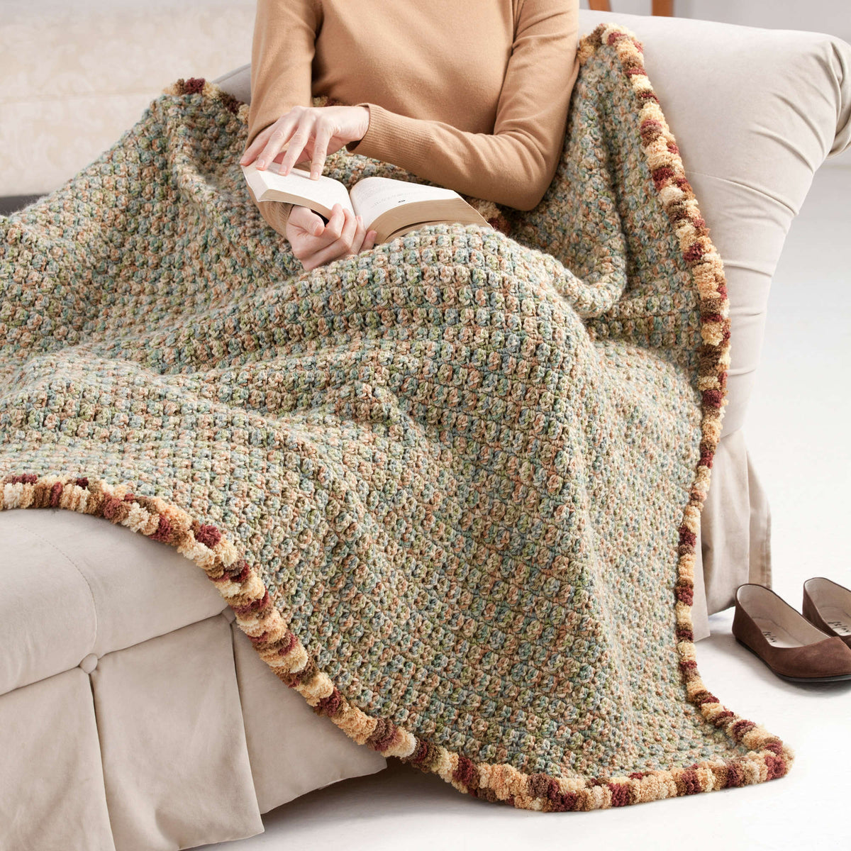 Crochet Throw made in Red Heart Pomp-a-Doodle Yarn