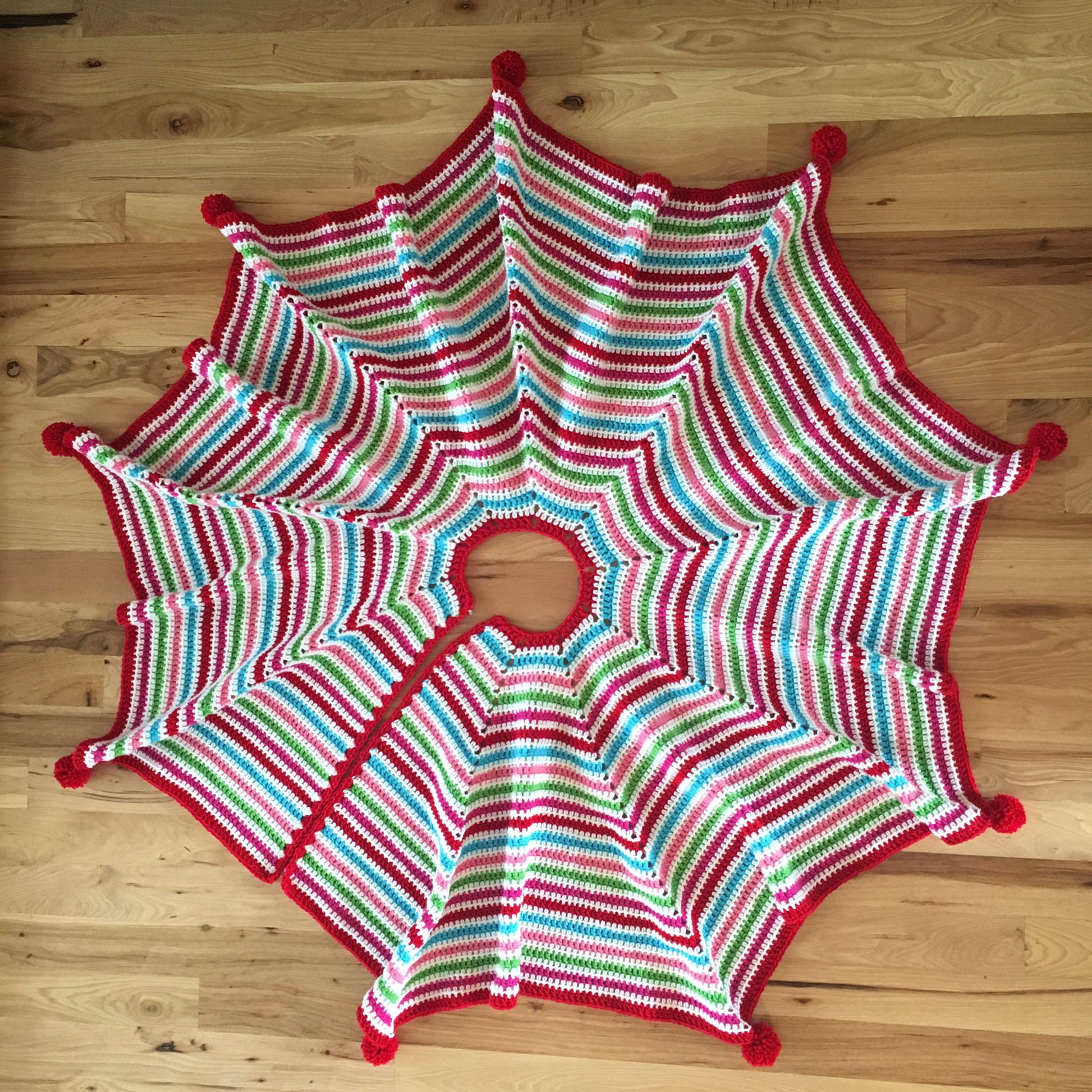 Free Red Heart Pompom Trimmed Tree Skirt Crochet Pattern