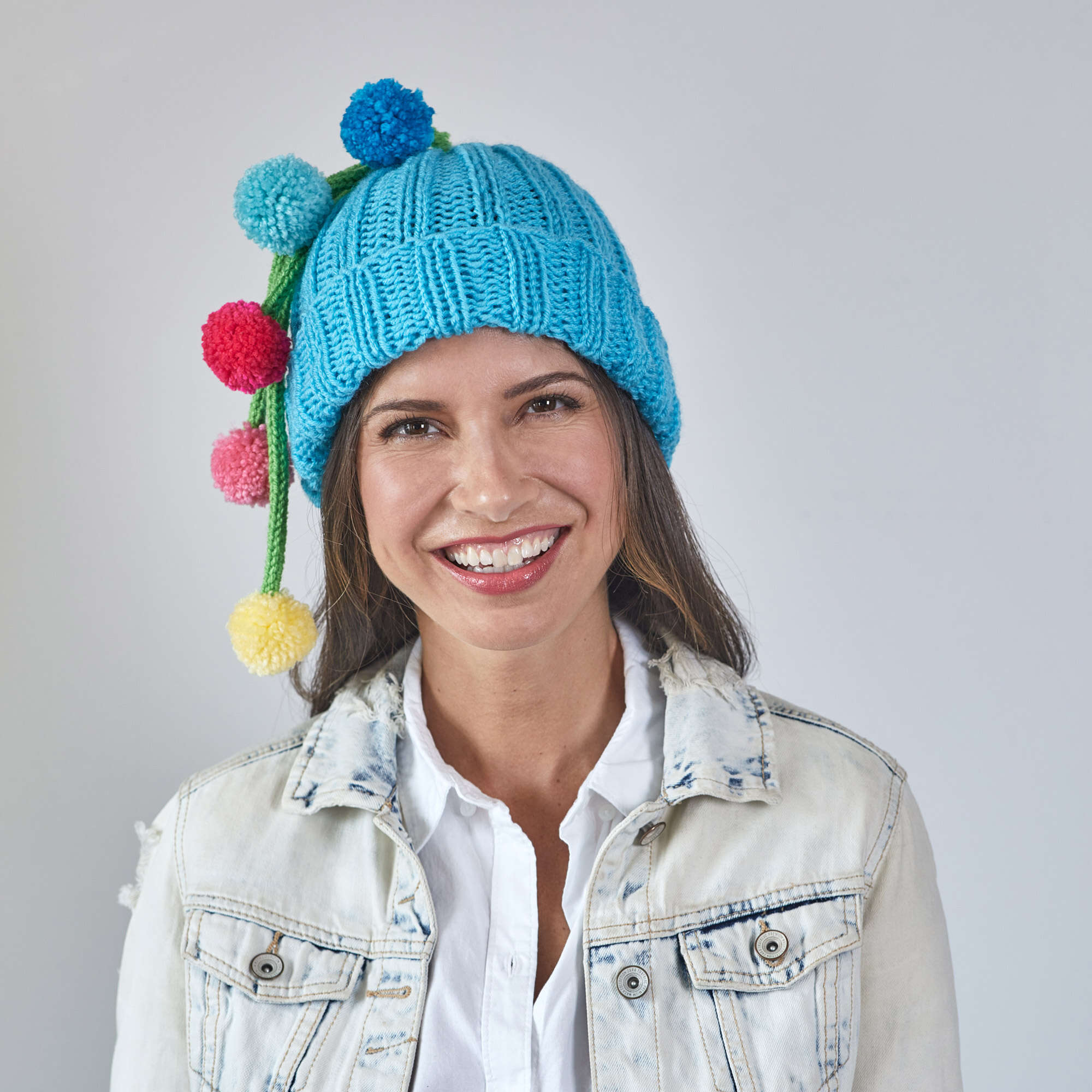 Free Beginner Red Heart Ribbed Hat with Pompom Tassels Knitting Pattern ...
