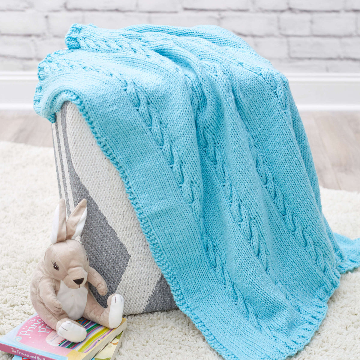 Knit Blanket made in Red Heart Bunches of Hugs Yarn