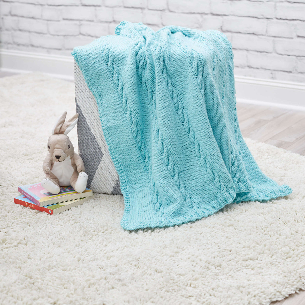 Knit Blanket made in Red Heart Bunches of Hugs Yarn