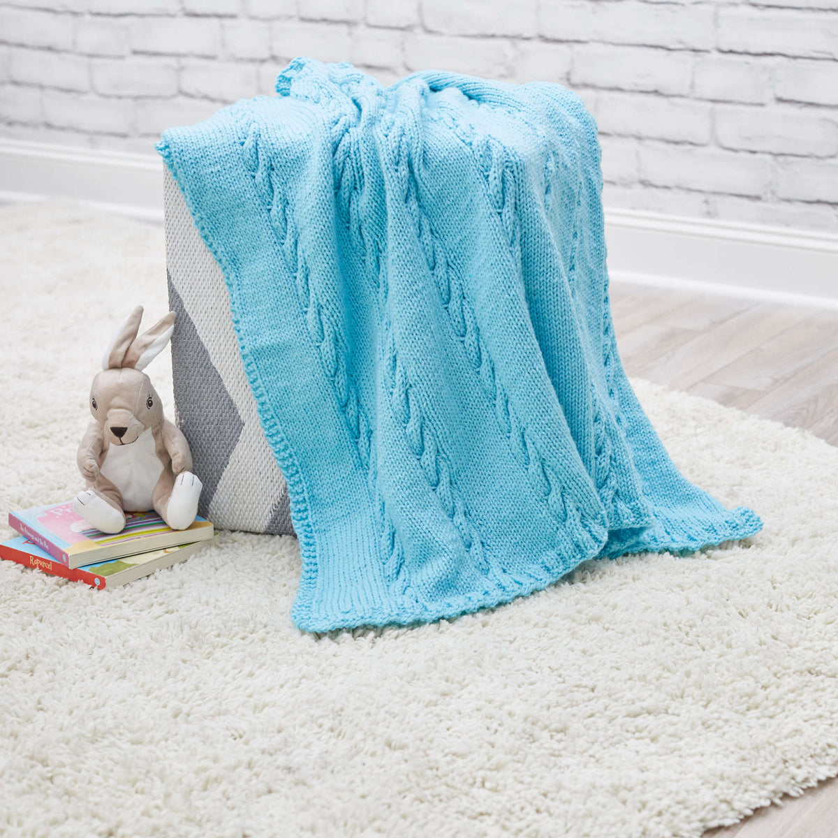 Knit Blanket made in Red Heart Bunches of Hugs Yarn