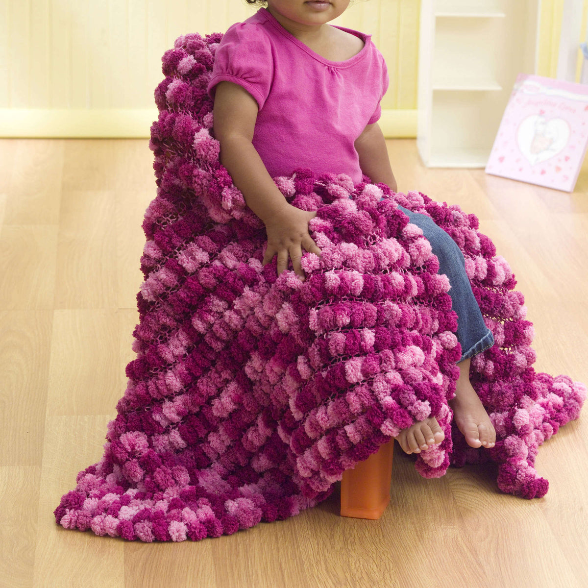 Knit Blanket made in Red Heart Pomp-a-Doodle Yarn