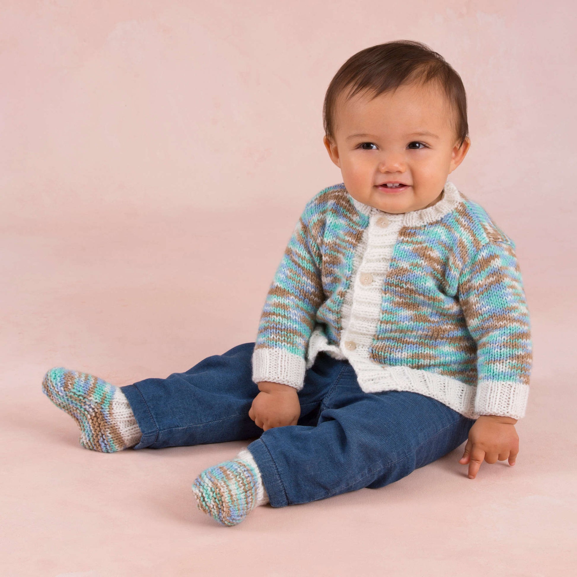 Free Red Heart Bouncing Boy Knit Cardigan And Booties Pattern