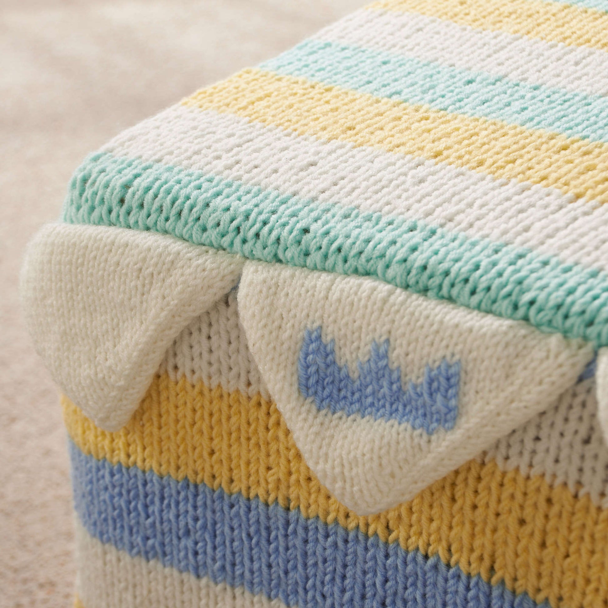 Free Red Heart Crown Point Ottoman Cover Knit Pattern