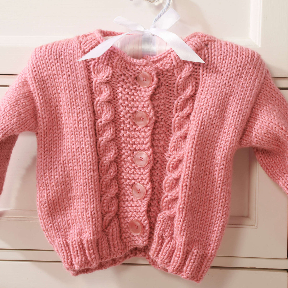 Knit Cardigan made in Red Heart Soft Baby Steps Yarn