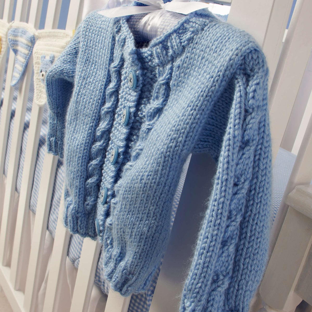 Knit Cardigan made in Red Heart Soft Baby Steps Yarn