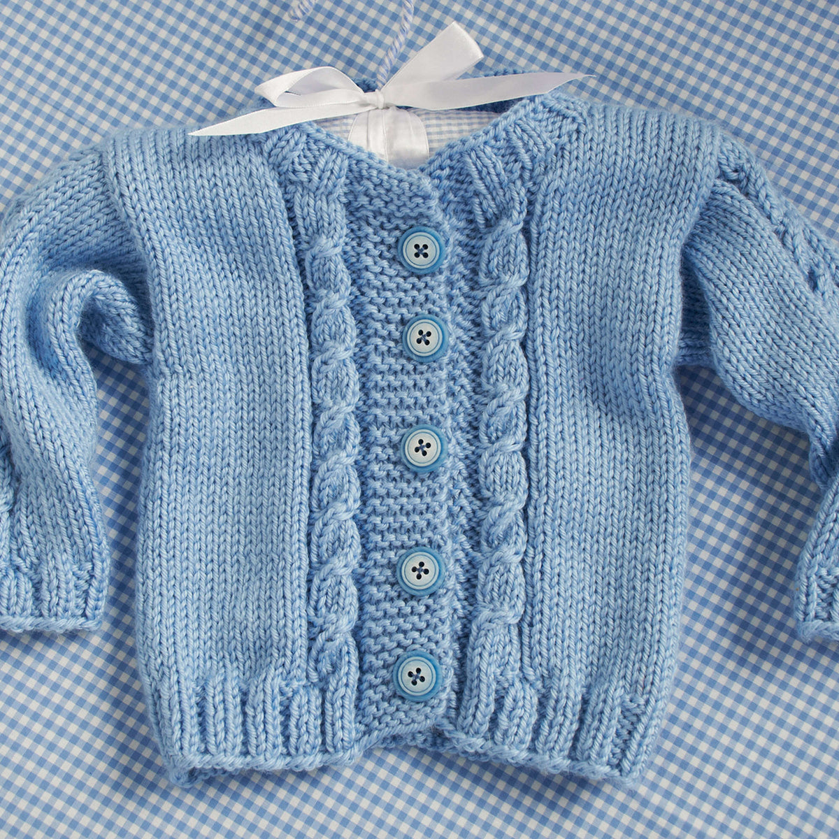 Knit Cardigan made in Red Heart Soft Baby Steps Yarn