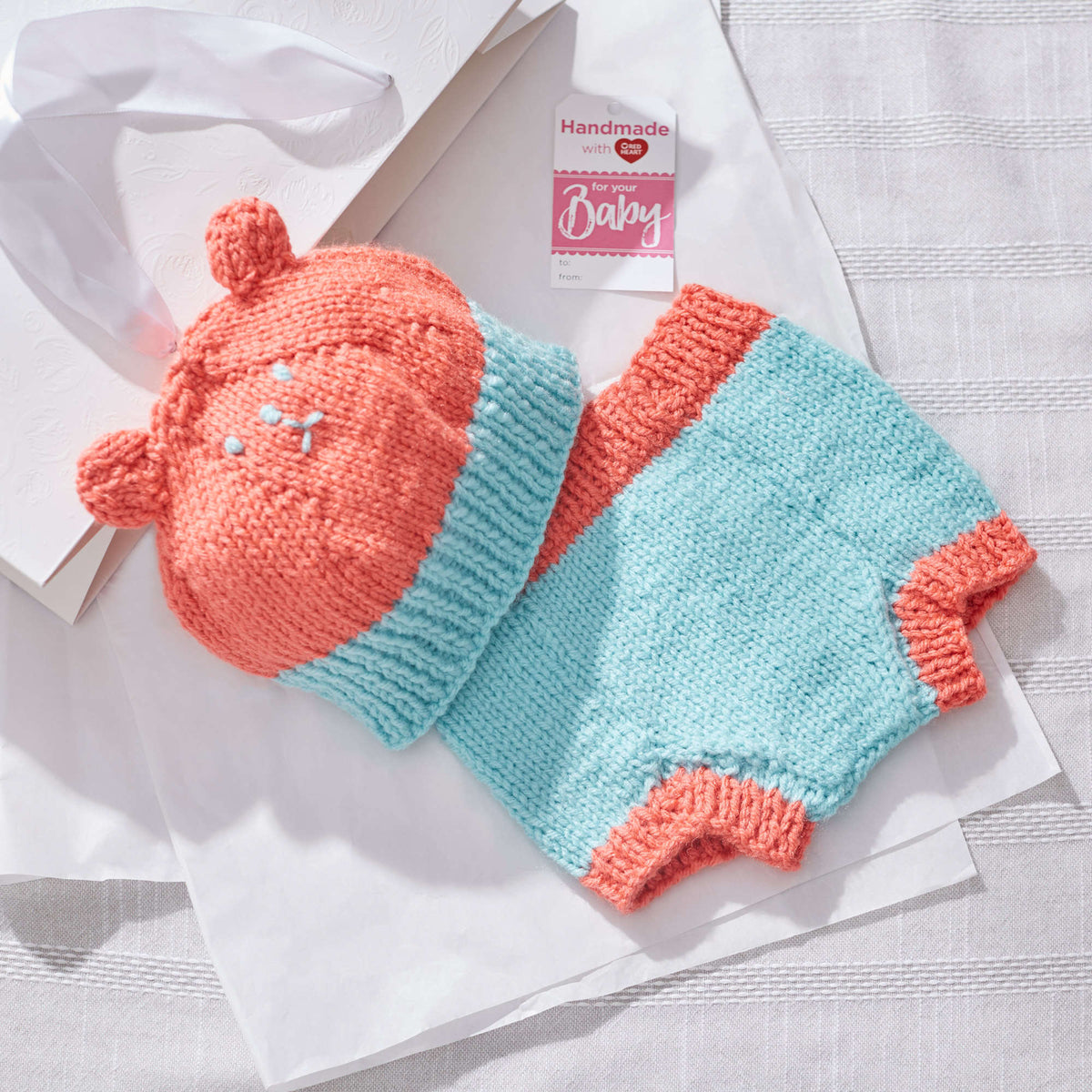 Knit Baby Cover made in Red Heart Baby Hugs Medium Yarn