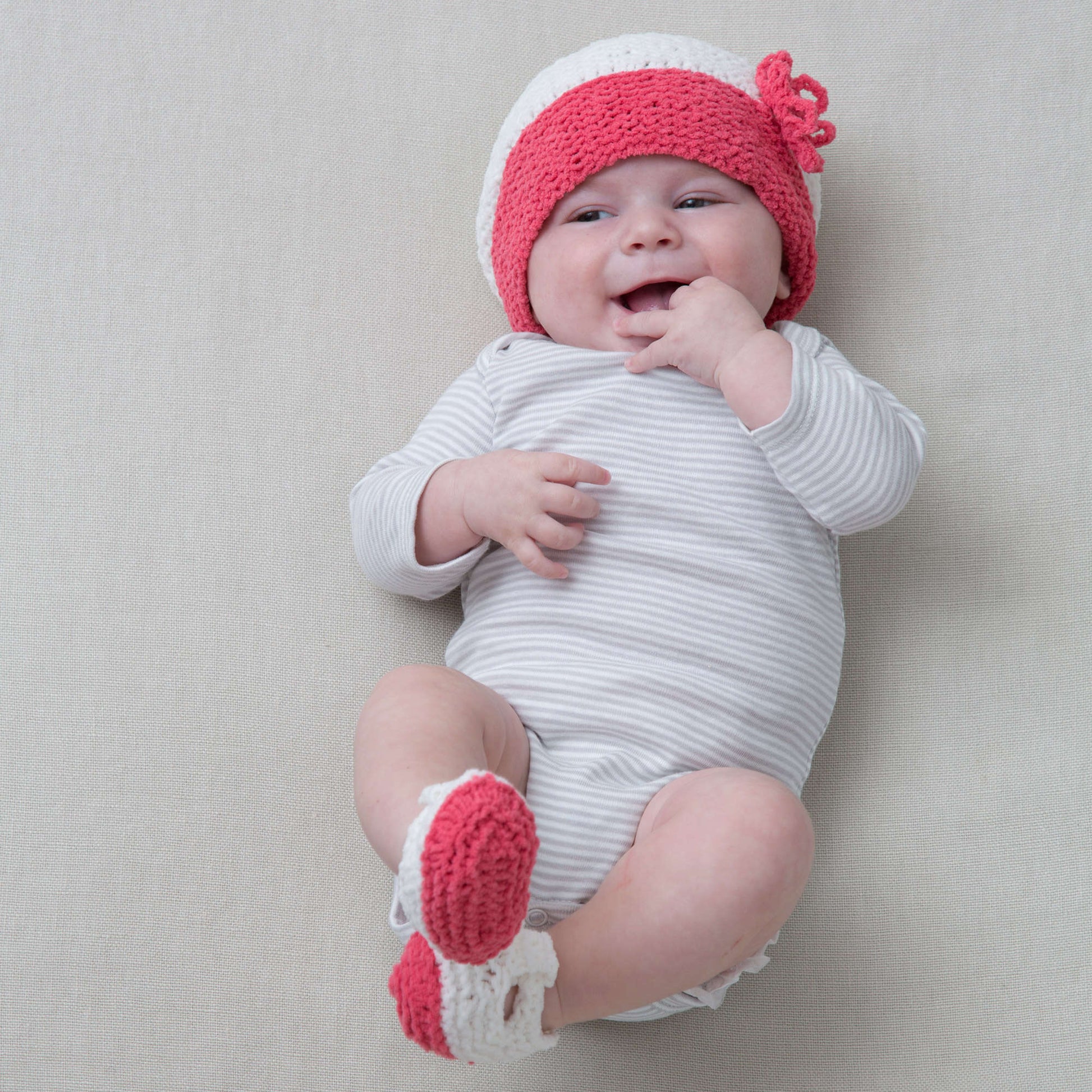 Free Red Heart Coral Cutie Hat & Booties Knit Pattern