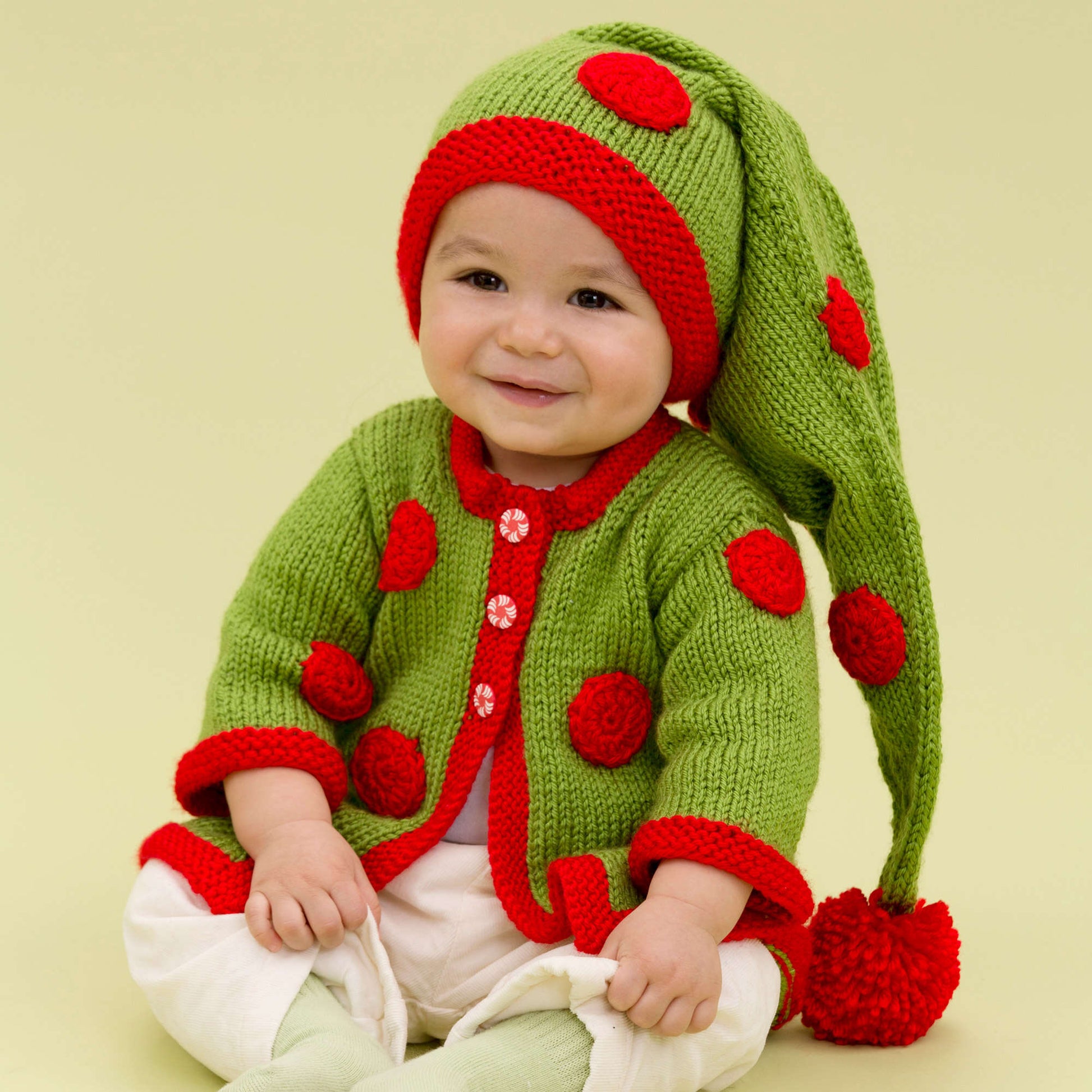 Free Red Heart Santa's Baby Elf Knit Pattern