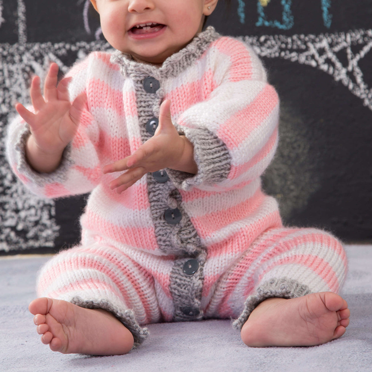 Knit Onesie made in Red Heart Soft Baby Steps Yarn