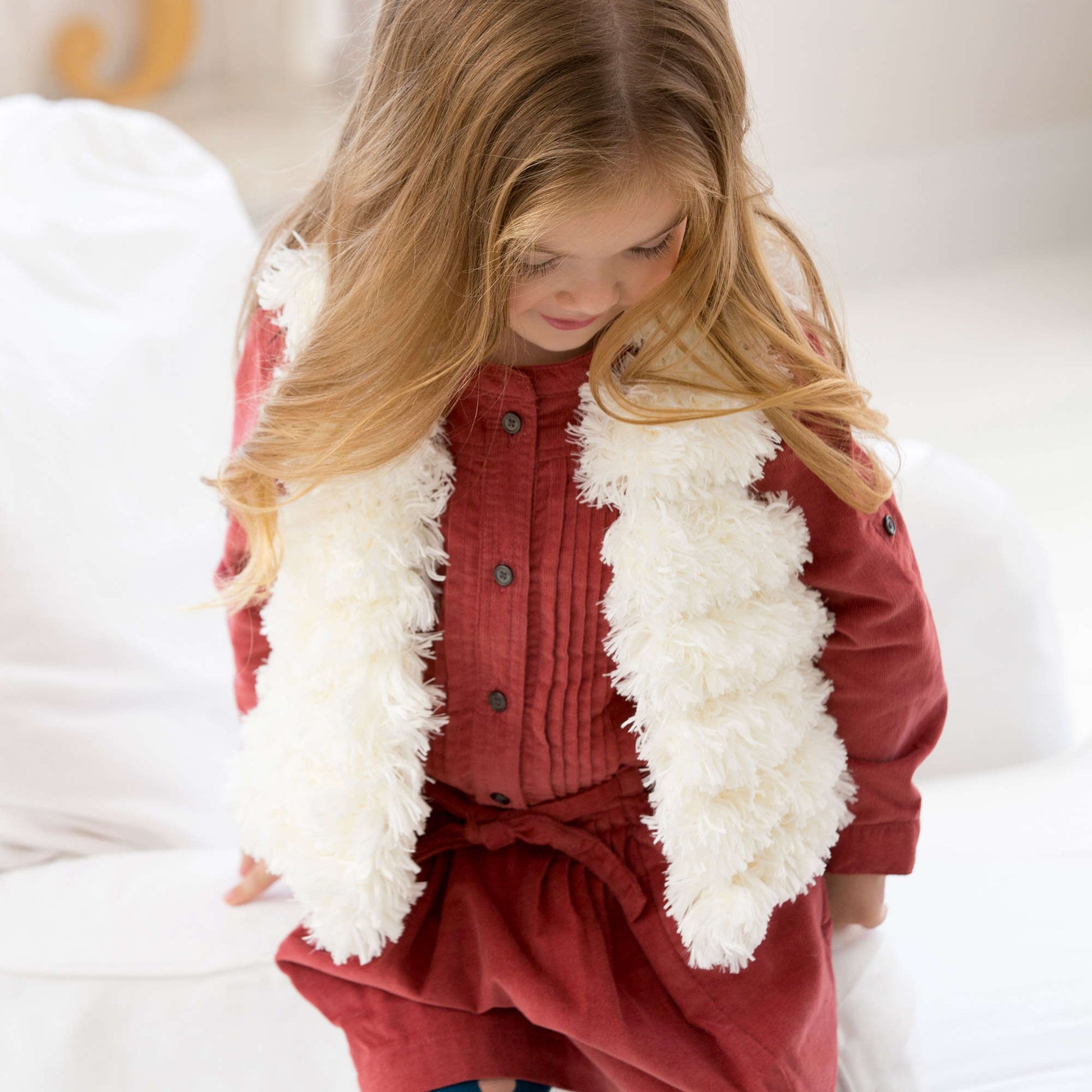 Free Red Heart Child's Trendy Fur Vest Knit Pattern