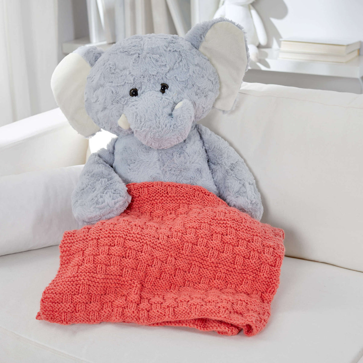 Knit Blanket made in Red Heart Bunches of Hugs Yarn