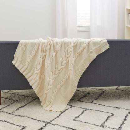 Red Heart Luxurious Cabled Throw Knit Throw made in Red Heart Soft Essentials Yarn