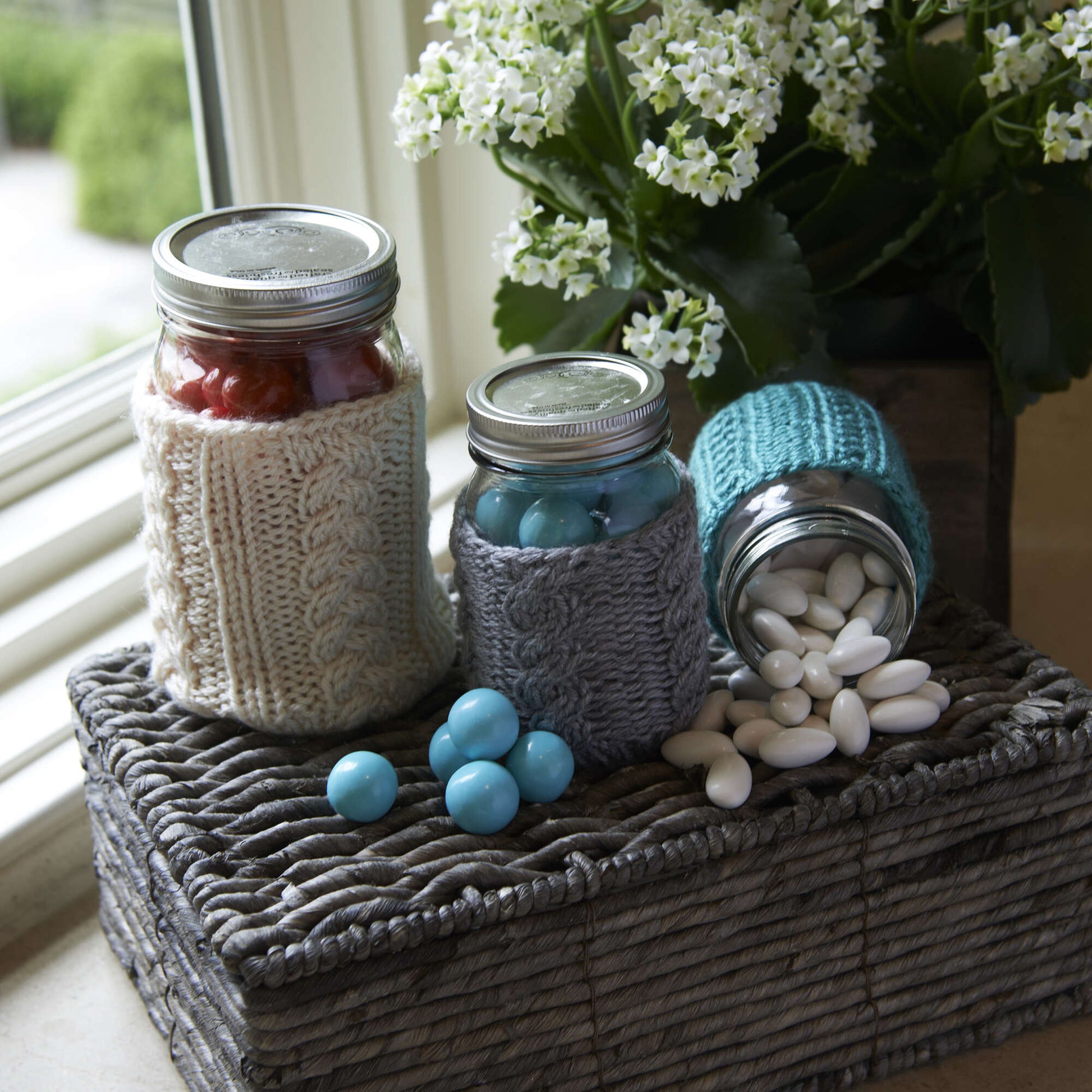 Free Red Heart Knit Cabled Jar Cozies Pattern