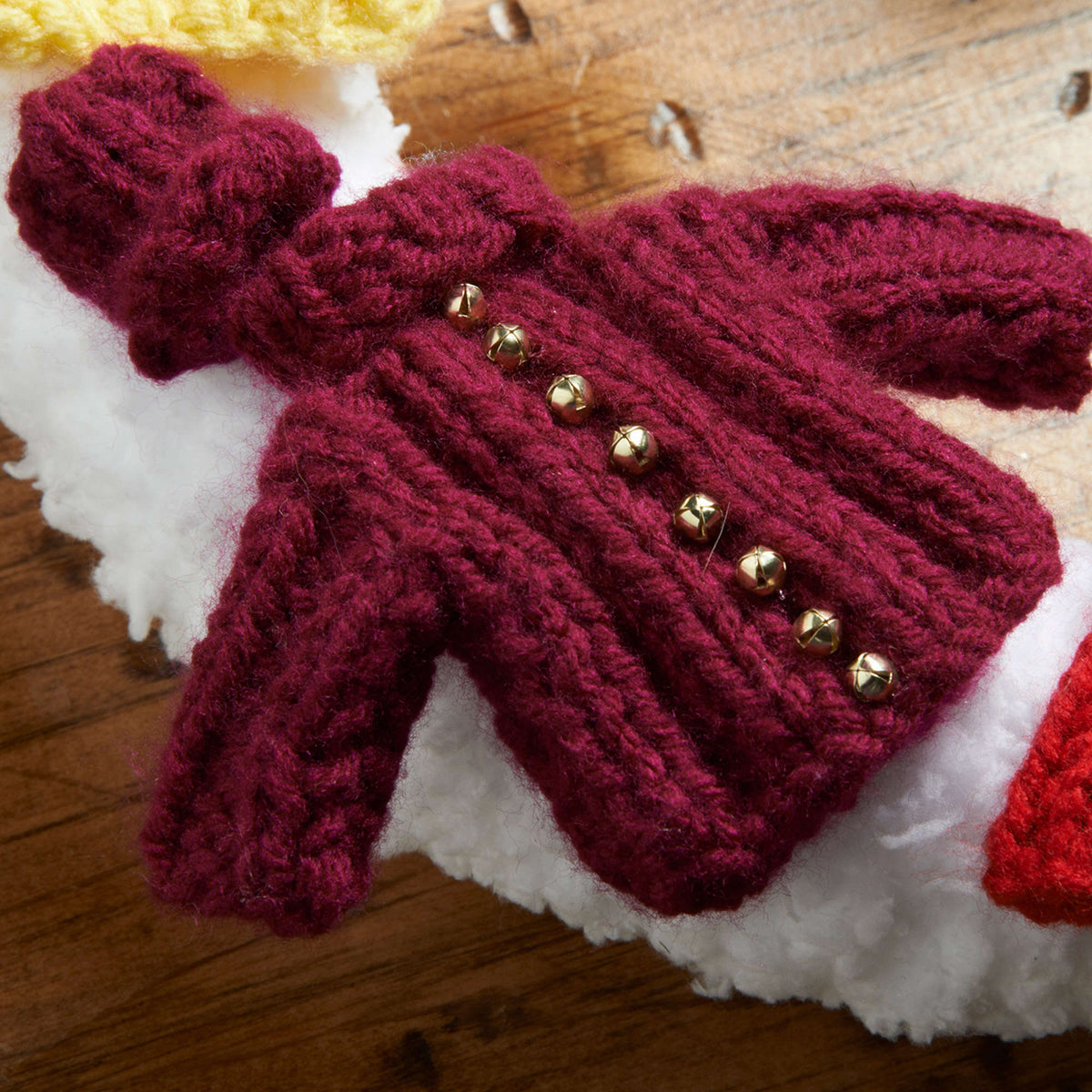 Knit Wreath made in Red Heart Buttercup Yarn