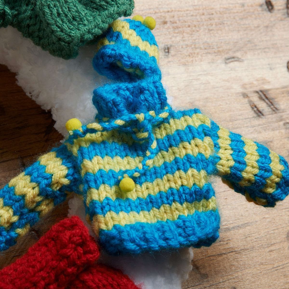 Knit Wreath made in Red Heart Buttercup Yarn