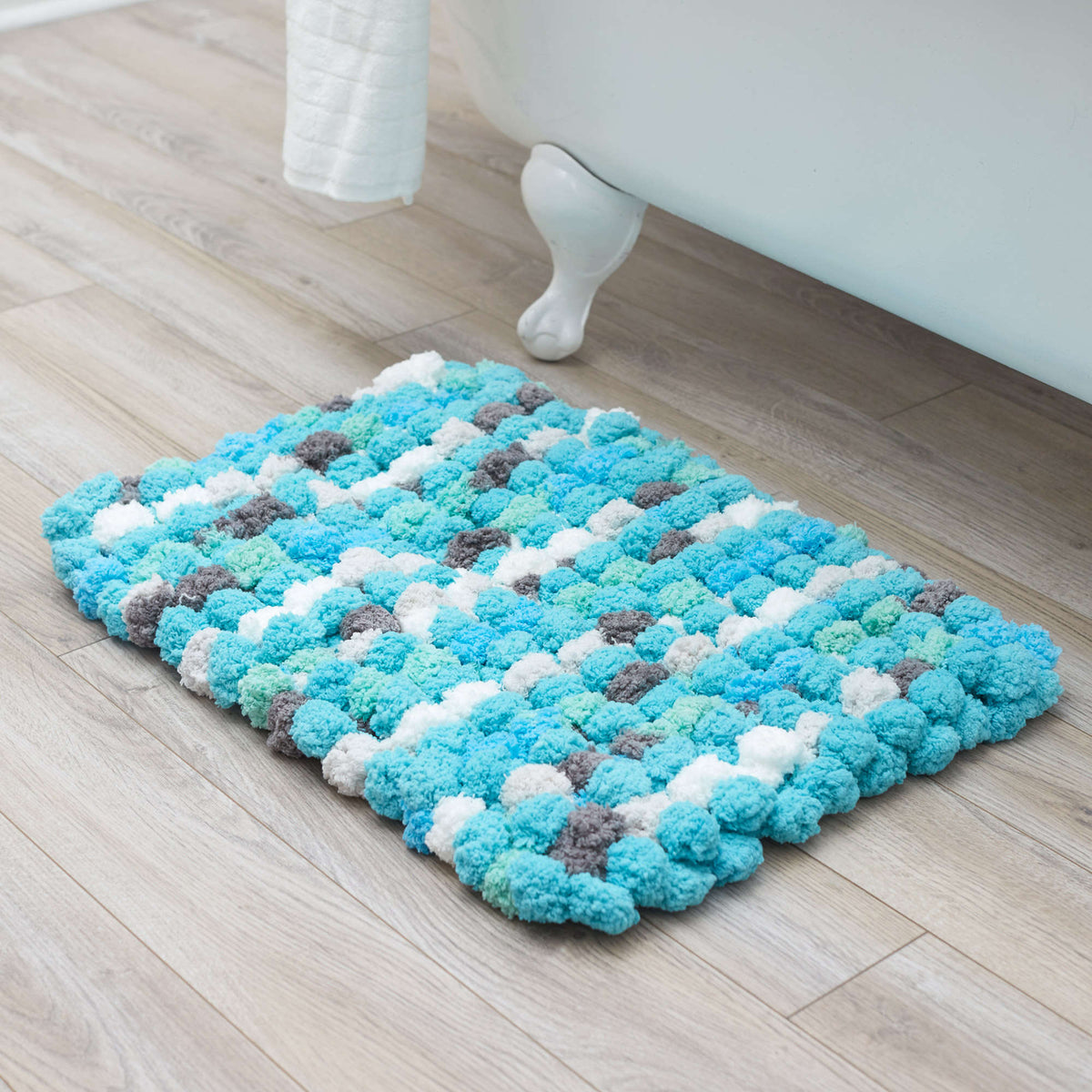 Knit Rug made in Red Heart Pomp-a-Doodle Yarn