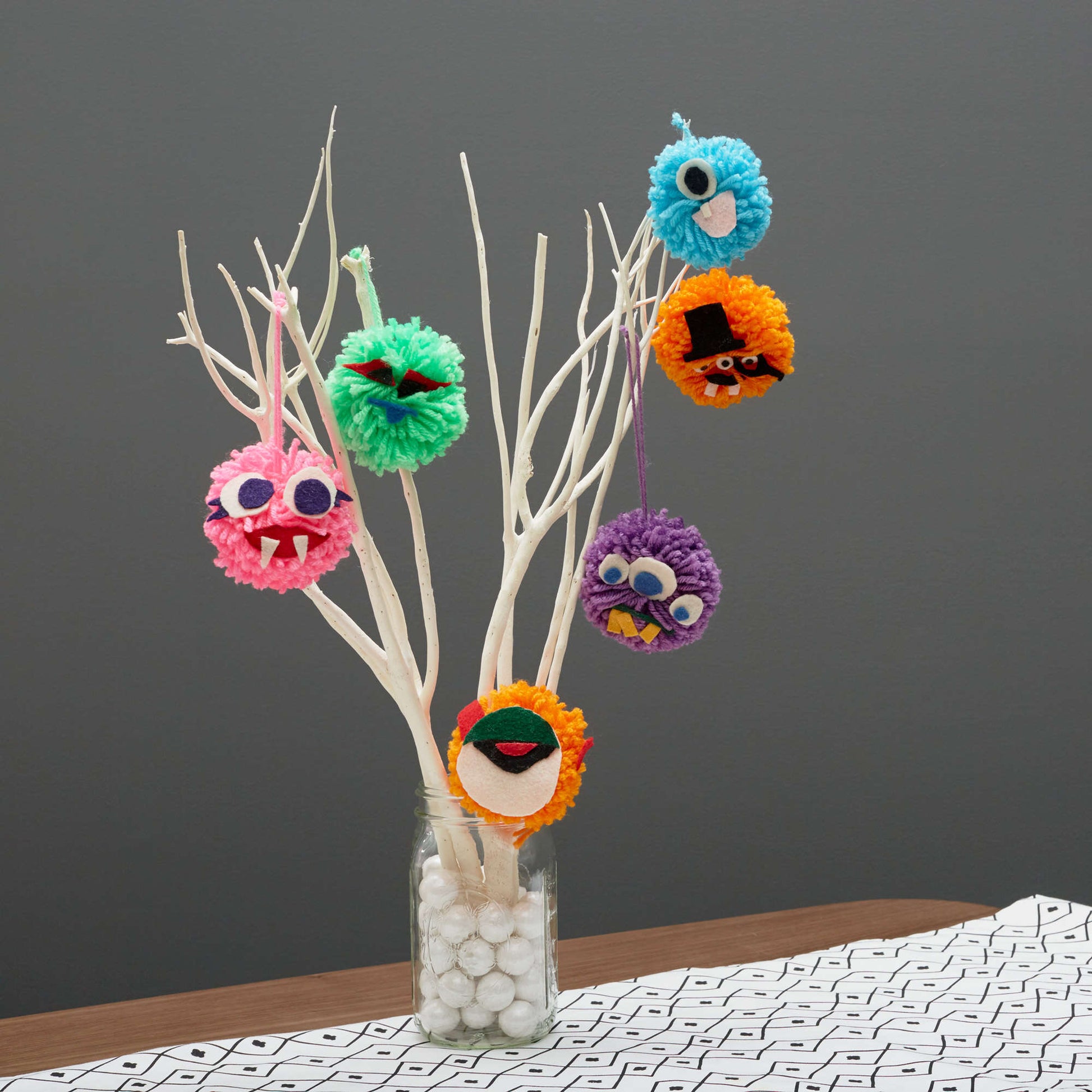 Free Red Heart Pompom Monsters Craft Pattern