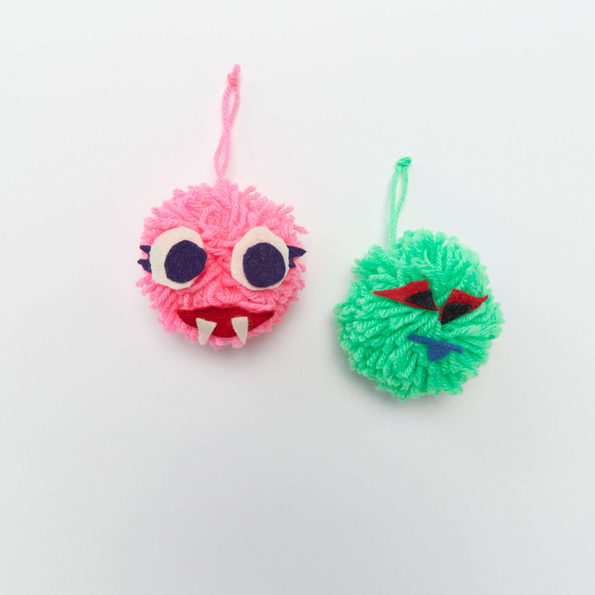 pom pom valentine monsters Free Beginner Red Heart Pompom Monsters Craft Pattern