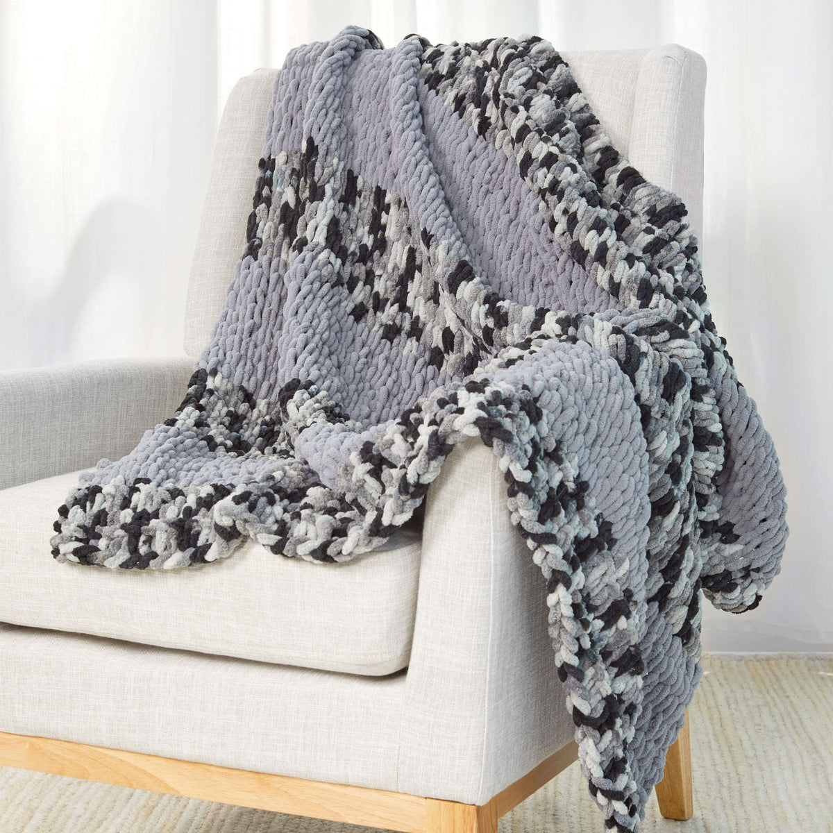 Craft Throw made in Red Heart Loop-It Yarn