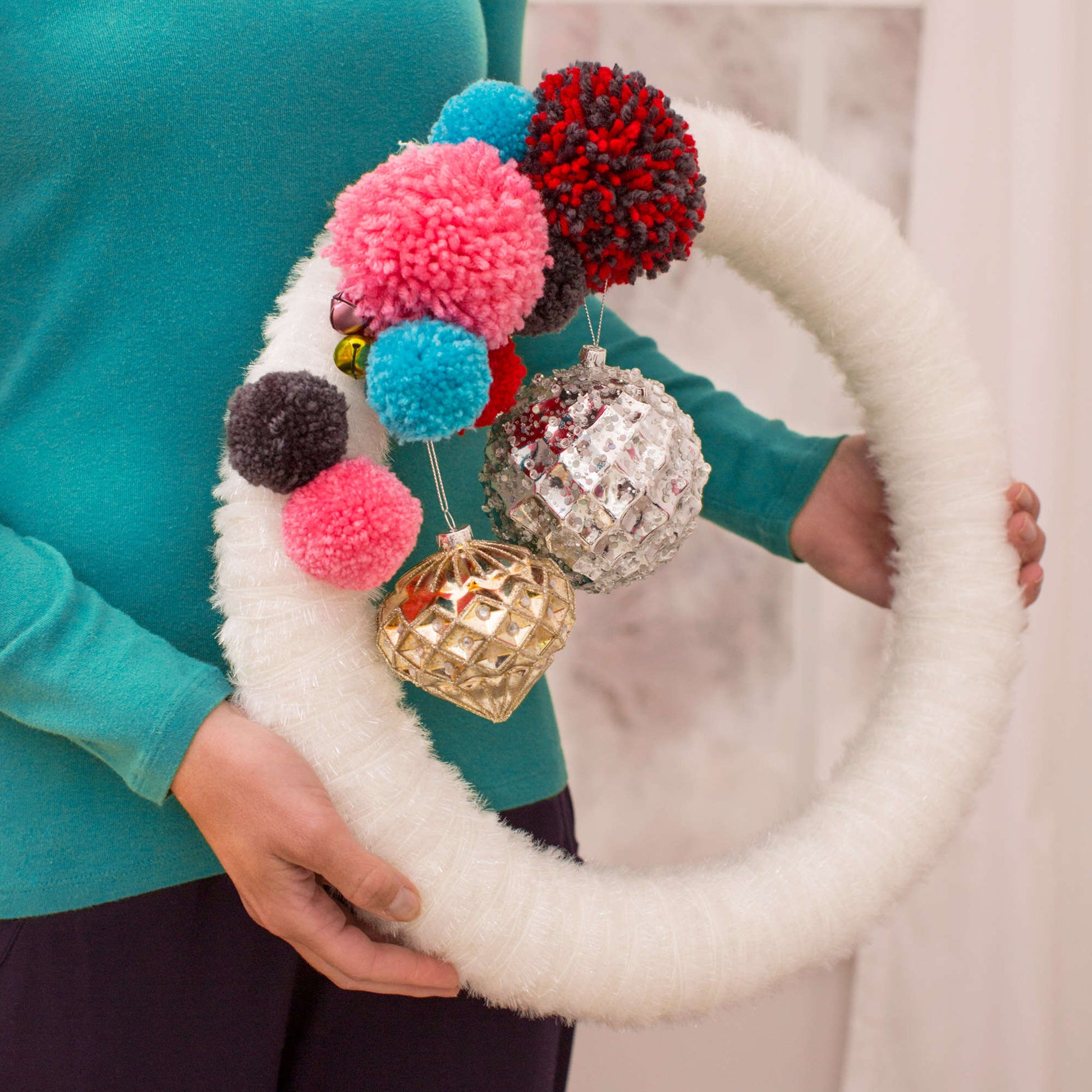 Red Heart Sparkle-Wrapped Pompom Wreath Red Heart Sparkle-Wrapped Pompom Wreath